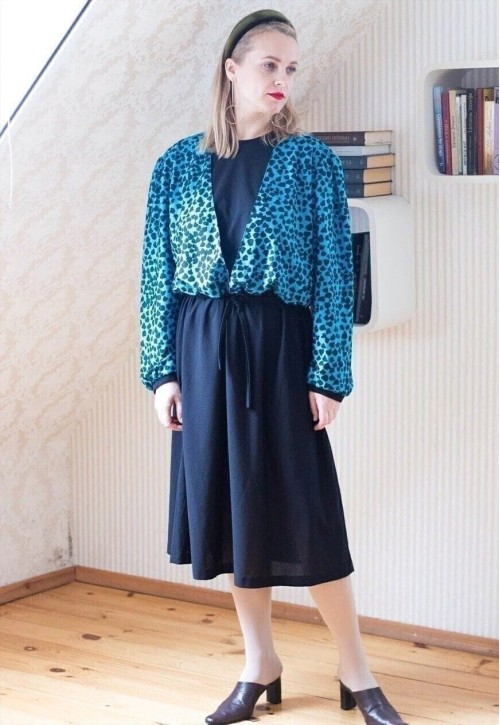 Black belted midi dress with blue patterned layer