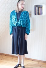 Black belted midi dress with blue patterned layer