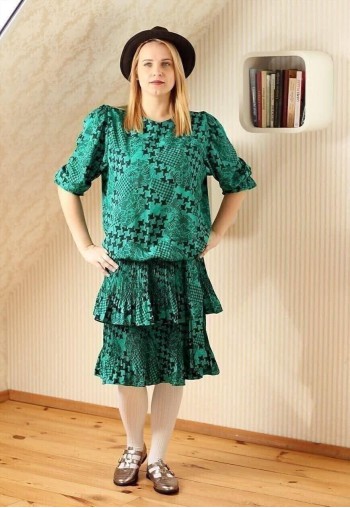 Green and black ruffle dress