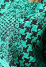 Green and black ruffle dress