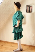 Green and black ruffle dress