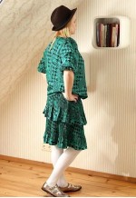 Green and black ruffle dress